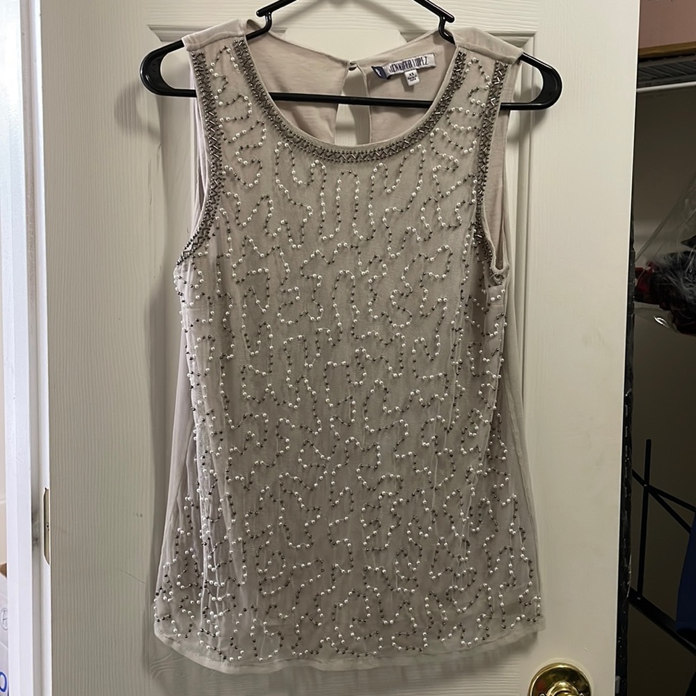 Jennifer Lopez sleeveless shirt
